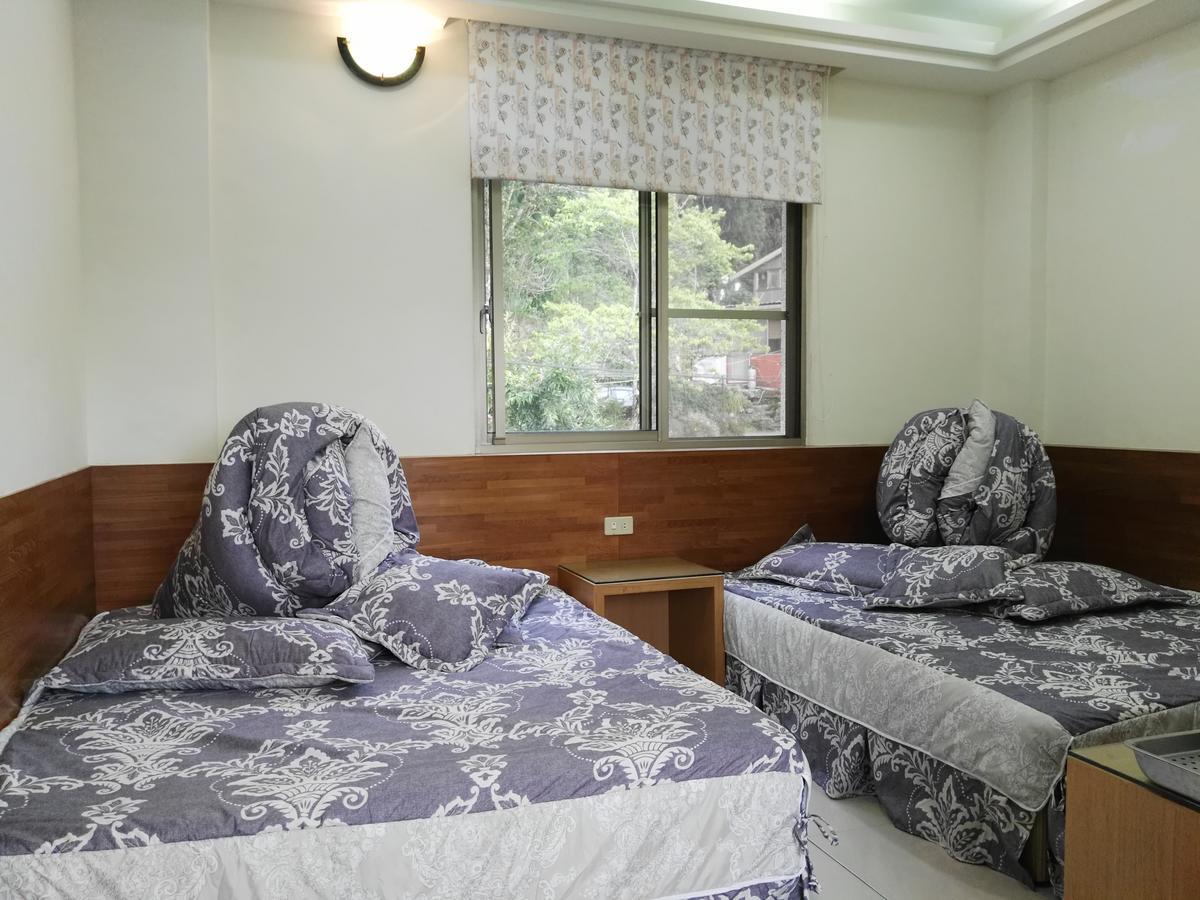 Qun Feng Hotel Fenqihu Exterior photo